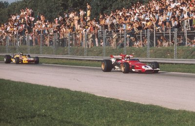 1970 Italian Grand Prix. Monza, Italy. 4-6 September 1970. Clay Regazzoni (Ferrari 312B) 1st position followed by Ronnie Peterson (March 701 Ford). by Anonymous - print