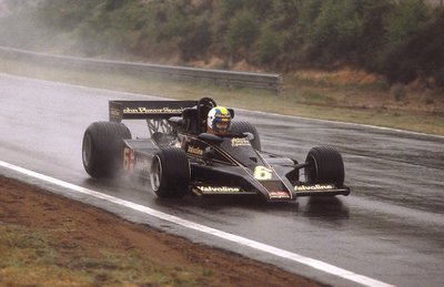 1977 Belgian Grand Prix. Zolder, Belgium. 3-5 June 1977. Gunnar Nilsson (Lotus 78 Ford) takes 1st position for his first and only win. by Anonymous - print