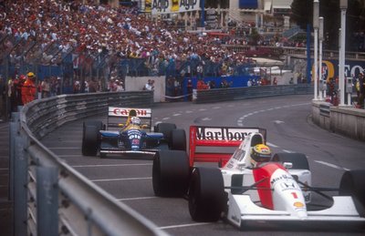 1992 Monaco Grand Prix. Monte Carlo, Monaco. 28-31 May 1992. Ayrton Senna (McLaren MP4/7A Honda) 1st position with Nigel Mansell (Williams FW14B Renault) 2nd position close behind, trying to pass in the last few laps of the race by Anonymous - print