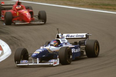 1996 European Grand Prix. Nurburgring, Germany. 26-28 April 1996. Jacques Villeneuve (Williams FW18 Renault) 1st position followed by Michael Schumacher (Ferrari F310) 2nd position by Anonymous - print