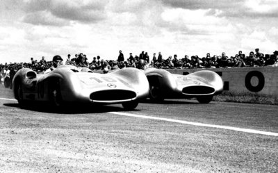 French Grand Prix, Reims. Juan Manuel Fangio and Karl Kling in the new streamlined Mercedes-Benz W196 by Anonymous - print