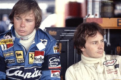 1981 Formula One World Championship. Ferrari team mates Didier Pironi and Gilles Villeneuve in the pit garage together. by Anonymous - print