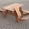 A-picnic-table-that-transforms-into-four-lounge-chairs-s