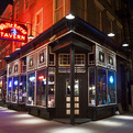 A-tour-of-new-york-citys-illuminated-storefronts-at-night-s