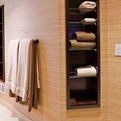 Bathroom-towel-niches-of-macassar-ebony-with-glas-shelves-s