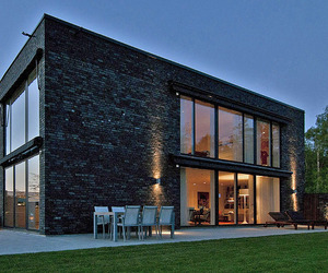Black-brick-villa-with-chic-scandinavian-charm-m