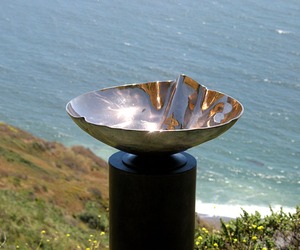 Crenelated-bronze-vessel-sinkwith-mirror-polish-and-patina-m