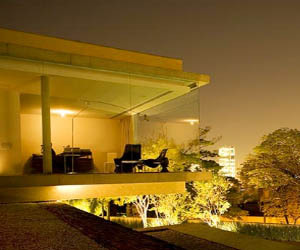 Flamboyant’s House, Brazil, by Marcio Kogan