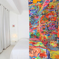 French-artist-covers-half-of-a-hotel-room-in-graffiti-s