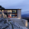 Modern-home-submerged-in-the-landscape-s