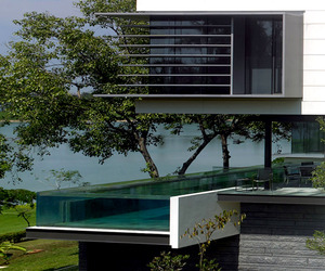 Modernist-home-with-suspended-pool-by-scda-m