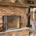 Outdoor-brick-fireplace-with-wood-mantel-by-bill-fry-s