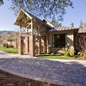Sweeping-interlocking-paver-driveway-graces-estate-home-s