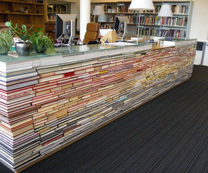 Table-made-of-books-in-library-m