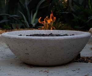 Wok-fire-pit-by-potted-m