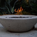 Wok-fire-pit-by-potted-s