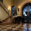 Wrought-iron-entry-door-and-staircase-railing-s