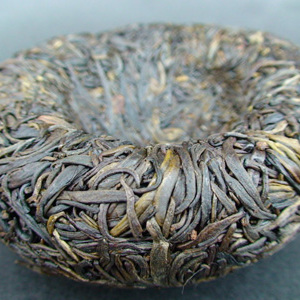 2009 Jinggu Purple Bud Big Tree Raw Pu Er Tuo Cha from JK Tea Shop