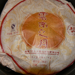 2010 Six Famous Tea Mountain Yunnan Moon pu-erh tea cake from Yunnan Six-Famous-Tea-Mountain Tea Industry Inc.