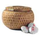 Changning Yiyou Organic Puerh mini tea cakes from Tea Cargo www.teacargo.co.uk