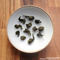 Tie Guan Yin (Iron Buddha) from driftwood tea
