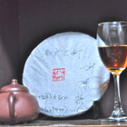 2012 Yi Wu Shan Da Ye Sheng Bing Stone-Pressed (Yi Wu Mountain Green Puer Cake) 357g 1 pc from Misty Peak Teas