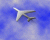 Airplane in Cloudy Skies