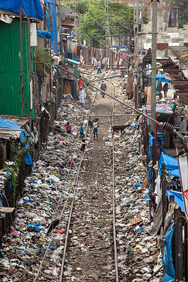 Garbage piled up along the tracks near the Bandra East slum in Mumbai, India.