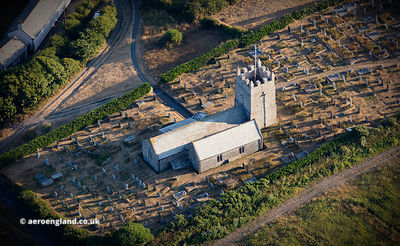St Symphorian's parish church Forrabury Cornwall from the air