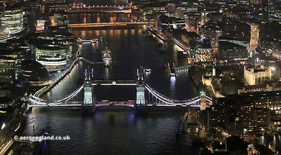 River Thames & Tower Bridge London by night. aerial photograph