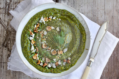 Gorgonzola Hazelnut Cilantro Pesto served in a ceramic bowl