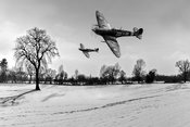 Low-flying Spitfires in winter black and white version