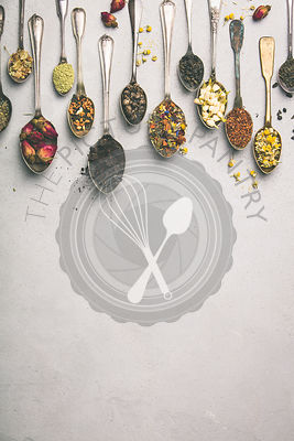 Assortment of dry tea in vintage spoons