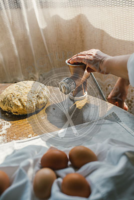 Woman Preparing Homemade Dough in the Kitchen and using a mincing machine. Preparation Raw Dough for Baking