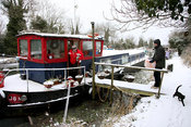 A couple bring home shopping in the snow to their home on the Grand Canal, Hazelhatch, Celbridge, Co. Kildare,.06.01.10.Pic. Maura Hickey/086 8541130..