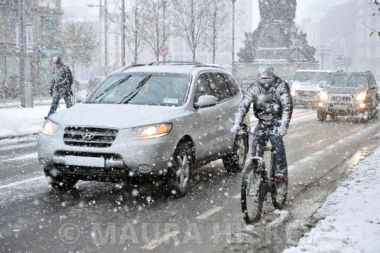 NEWS:.Commuters on O'Connell Street, Dublin