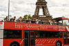 Tourists Pass by The Eiffel Tower on Bus