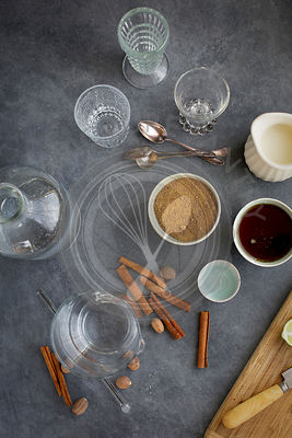 Almond Lime Italian Soda in the making. Photographed on dark gray background.