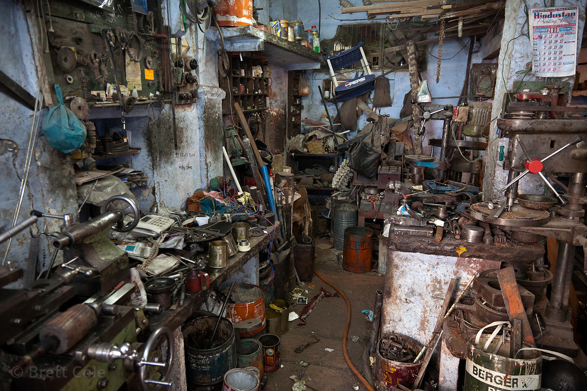 Brett Cole Photography An impossibly cluttered machine shop in