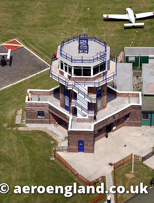 aerial photograph of the worlds oldest operational airport control tower at Baton aerodrome Greater Manchester England UK