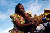 Ghana - Tamale - Agnes Chiravera hugs a street child