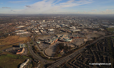 aerial photograph of the Trafford Centre with Manchester City Centre in the background