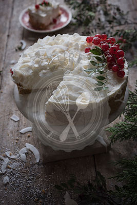 Coconut cheesecake in a rustic kitchen