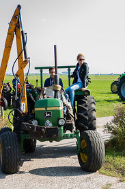 Katwoude, Netherlands - 2018-09-02: Second Oltimer Tractor Tour, Katwoude - Waterland. Participants of the oldtimer tractor tour on their tractor as they start the tour in Katwoude