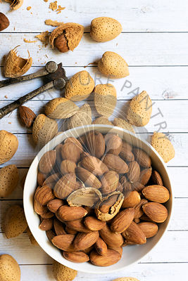 Raw almond kernals in a bowl.