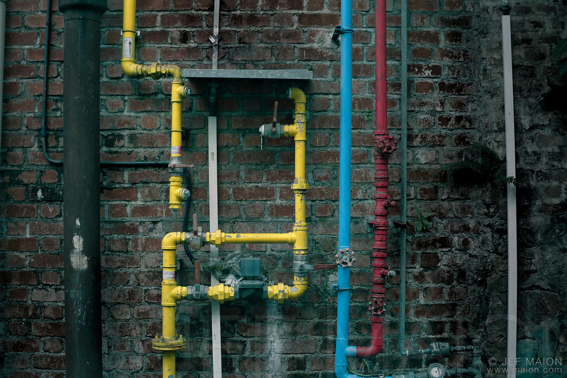 Image Colorful pipes on brick wall Stock photo by JF Maion