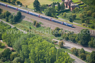 Aerial view of train on railway / tracks