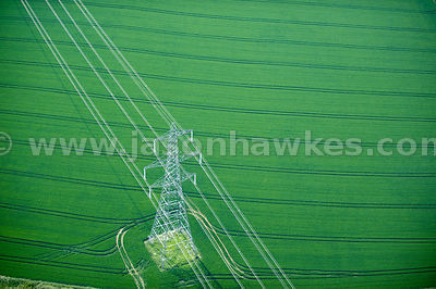 Aerial view of electric Pylon in fields near Littlebury, Essex