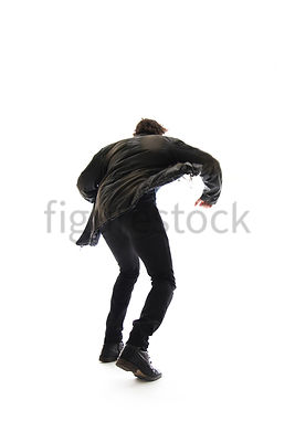 A Figurestock image of a mystery man in a jacket, running – shot from low level.
