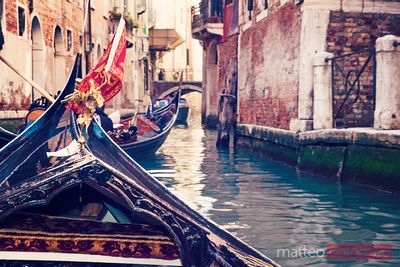 Gondolas on a canal Venice, Italy